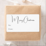 Moderne Boho Merry Christmas rechthoekig cadeau Etiket<br><div class="desc">Vier de vreugde van het seizoen met dit moderne boho Merry Christmas rechthoekige cadeau label. Het unieke en chique bewerkbare script creëer is een vleugje charme en individualiteit. Het eenvoudige, elegante zwart-wit ontwerp, met een klassieke bohemian boog lijst, roept een grillige winterambiance op. Het minimale en delicate feestelijke lettertype voegt...</div>