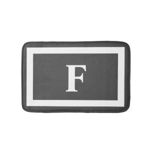 Moderne eenvoudige grijze witte monogram badmat