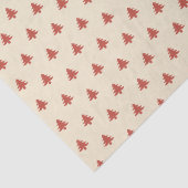 Moderne eenvoudige rode kerstbomen op beige tissuepapier (Detail)