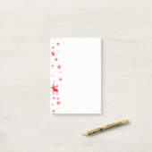 Moderne, eenvoudige rode, losse sneeuwvlokken post-it® notes (Op bureau)