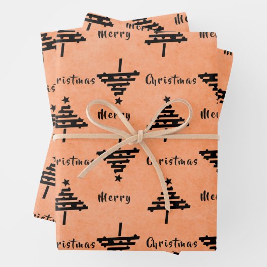 Moderne feestdag met zwarte kerstbomen inpakpapier vel (In situ)