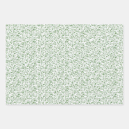 Moderne feestelijke groene speckkels met scheurtje inpakpapier vel
