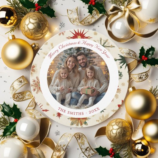 Moderne gouden en rode sneeuwvlokken rond feestdagenkaart