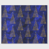 Moderne gouden kerstbomen op blauwe zijde cadeaupapier (Vlak)