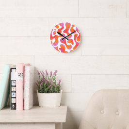 Moderne Gradiënt Kladden Patroon in Roze en Oranje Ronde Klok