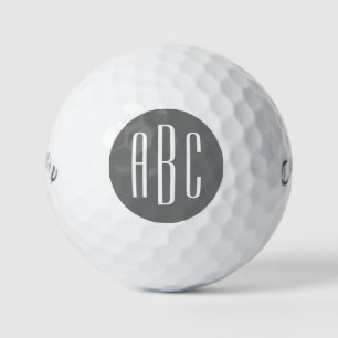 Moderne grijze en witte drieletter monogram golfballen