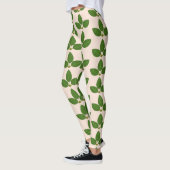 Moderne groene laurier laat patroon op ivoor achte leggings (Links)