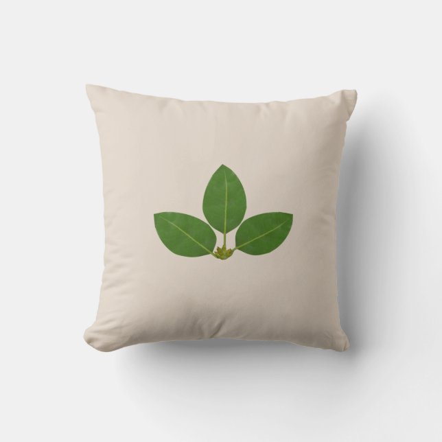 Moderne groene laurierbladeren op lichtbeige kussen (Voorkant)