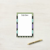 Moderne groene paarse en blauwgroen post-it® notes (Op bureau)