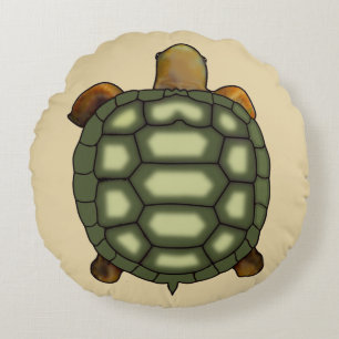 Moderne groene schildpad op beige rond kussen