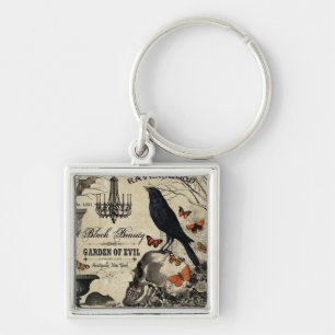 moderne halloween kraai en schedel sleutelhanger