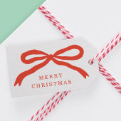 Moderne handgetekende rode boog kerstvakantie cadeaulabel