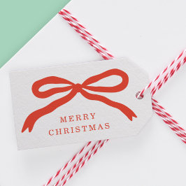 Moderne handgetekende rode boog kerstvakantie cadeaulabel