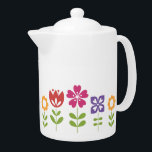 Moderne heldere kleurrijke lentebloemen theepot<br><div class="desc">Rijen bloemen in heldere,  vette kleuren.</div>