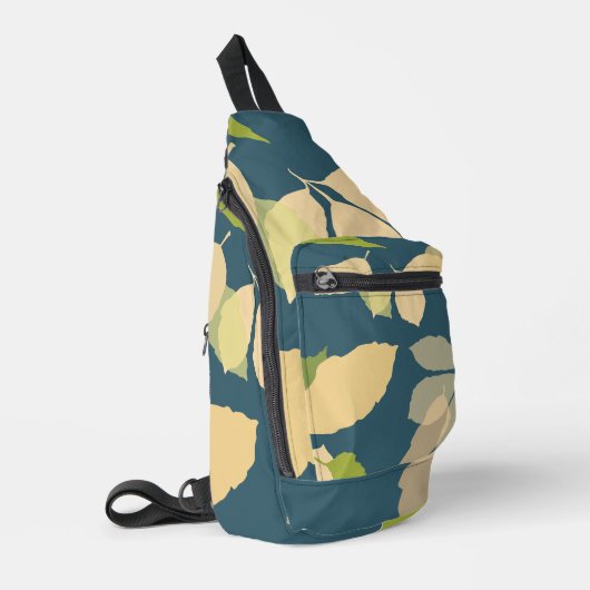 Moderne herfstbladeren met turquoise achtergrond sling bag (Linkerhoek)