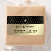 Moderne honingraat gouden bij Honingpot Label (Insitu)