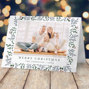 Moderne kerstavond en botanische bessen feestdagen kaart