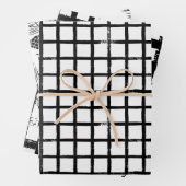 Moderne kerstinpakken voor zwarte en witte pensele inpakpapier vel (In situ)