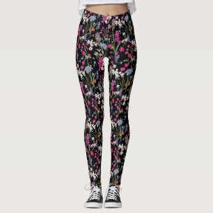 Moderne kleurrijke bloemenpatroon zwarte achtergro leggings