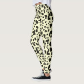 Moderne koeienprint op pastelgeel leggings (Links)