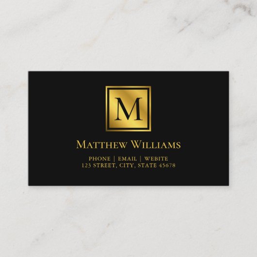 Moderne minimale monogram zwart en goud visitekaartje (Voorkant)