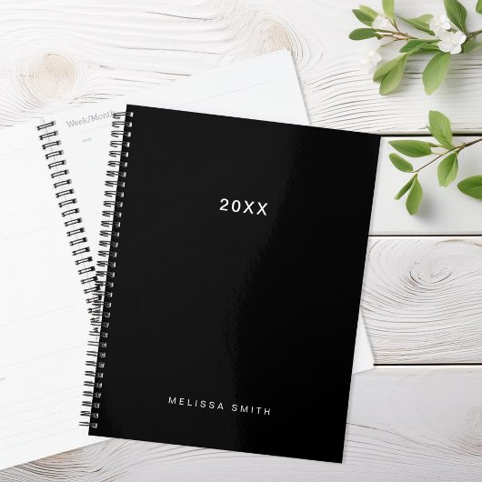 Moderne minimale zwarte plank planner