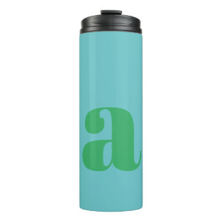 Moderne monogram beginletter in blauw en groen thermosbeker