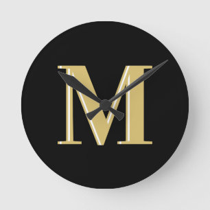 Moderne monogram typografie goud zwart ronde klok