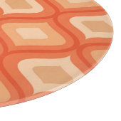 Moderne ogee sinaasappel uit de midden eeuw en bei snijplank (Hoek)