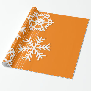 Moderne oranje en witte sneeuwvlokken voor kerstmi cadeaupapier