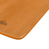 Moderne, oranje sjabloon voor vaste kleuren, zwart snijplank (Hoek)