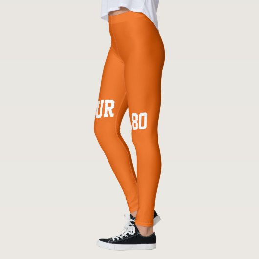 Moderne oranje wittekst werkout leggings (Links)