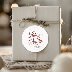 Moderne retro laat het kerstscript sneeuwen Red Ronde Sticker