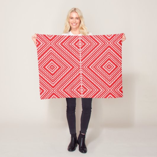 Moderne rode geometrische fleece deken (In situ)