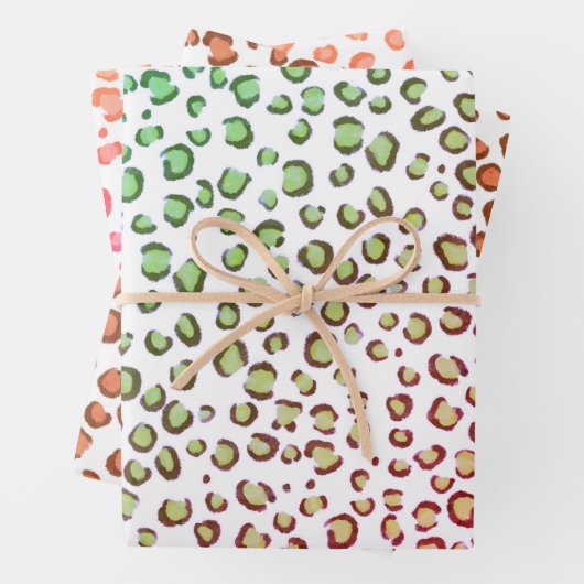 Moderne sneeuwluipaard rode roze groene proefdruk inpakpapier vel (In situ)