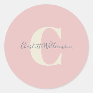 Moderne stijlvolle kalligrafie monogram naam roze ronde sticker