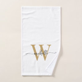 Moderne stijlvolle script witte gouden monogram na handdoek