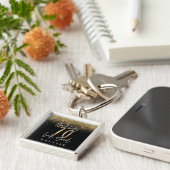 Moderne, stijlvolle zwarte en goudglitter 70 jaar sleutelhanger (Zijkant)