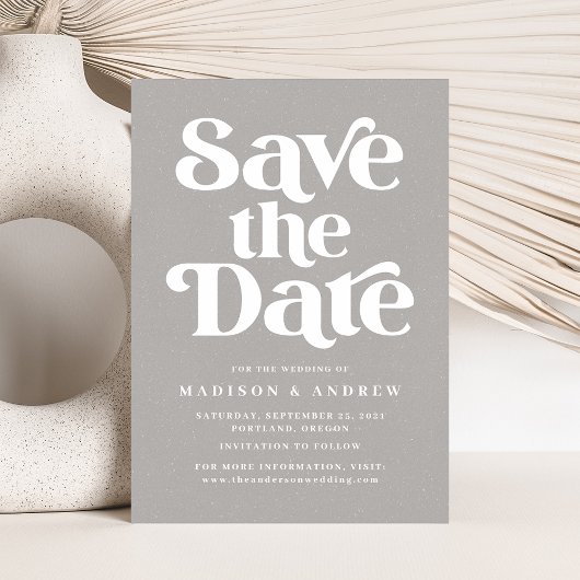 Moderne typografie gespikkelde grijs en wit save the date