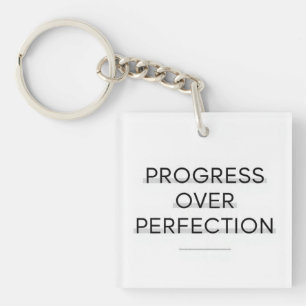 Moderne typografie vooruitgang boven perfectie tek sleutelhanger