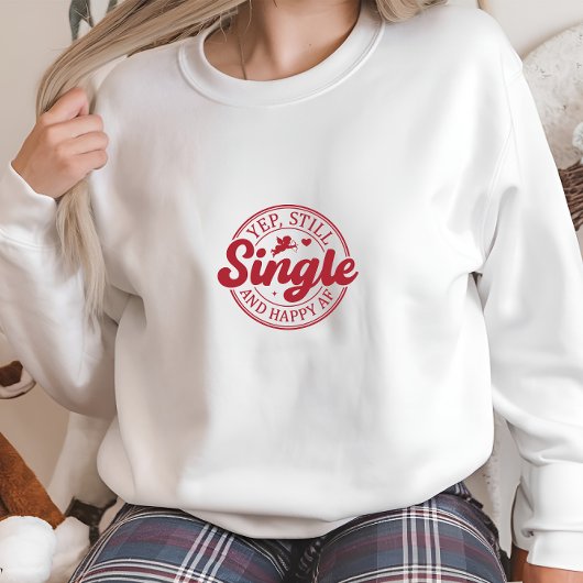 Moderne witte single en vrolijke print trui