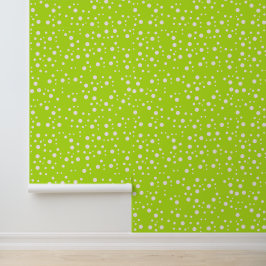 Moderne witte stippen op lichtgroen behang