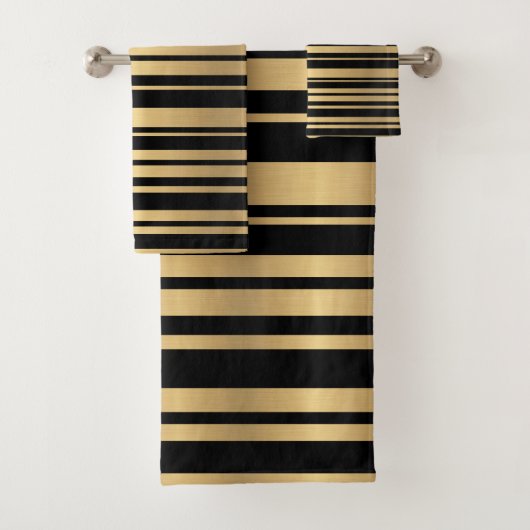 Moderne zwarte en gouden gestreepte handdoeken (Insitu)
