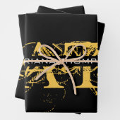 Moderne, zwarte en gouden monogrammen inpakpapier vel (In situ)