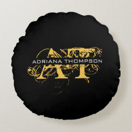 Moderne, zwarte en gouden monogrammen rond kussen