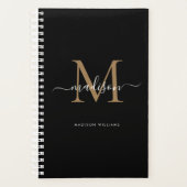 Moderne zwarte goudmonogram Elegant Script Name Planner (Voorkant)