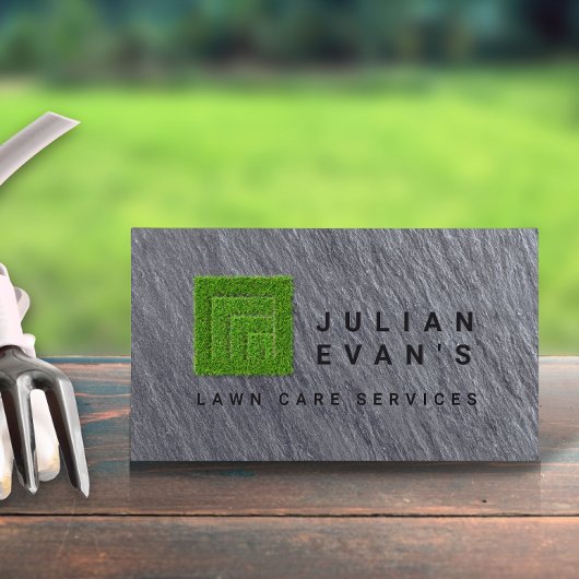 Moderne zwarte steen landschapsarchitectuur gazon visitekaartje