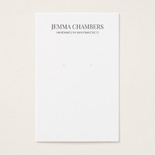 Moderne zwarte witte oorringen — juweliersweergave visitekaartje