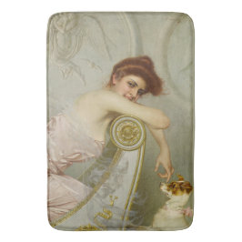 Modieuze schoonheid spelen met haar puppy hond badmat