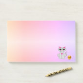 Moe cartoontekening van een kat op pastelkleuren post-it® notes (Op bureau)